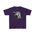 Never Needed™ “Still Moving” Tee — Kids Edition (Drop 04)